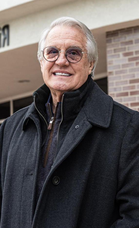 Portrait of Jim McHann outside the Doermer School of Business Building